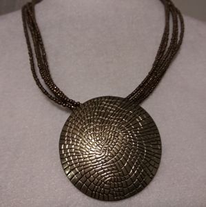Vintage multistrand seed bead necklace with disc pendant